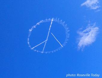 Peace sign sky writer