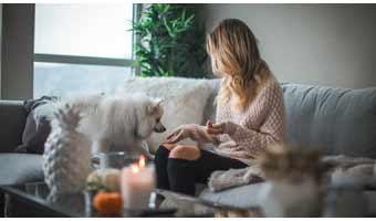women at home with pets